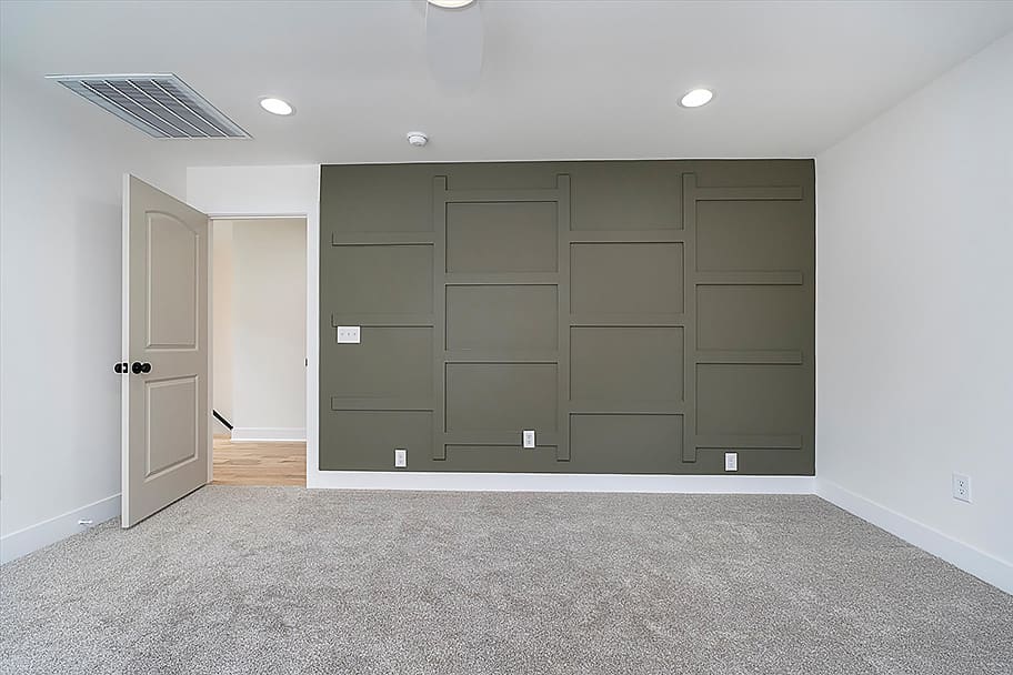 Green Accent Wall Primary Bedroom